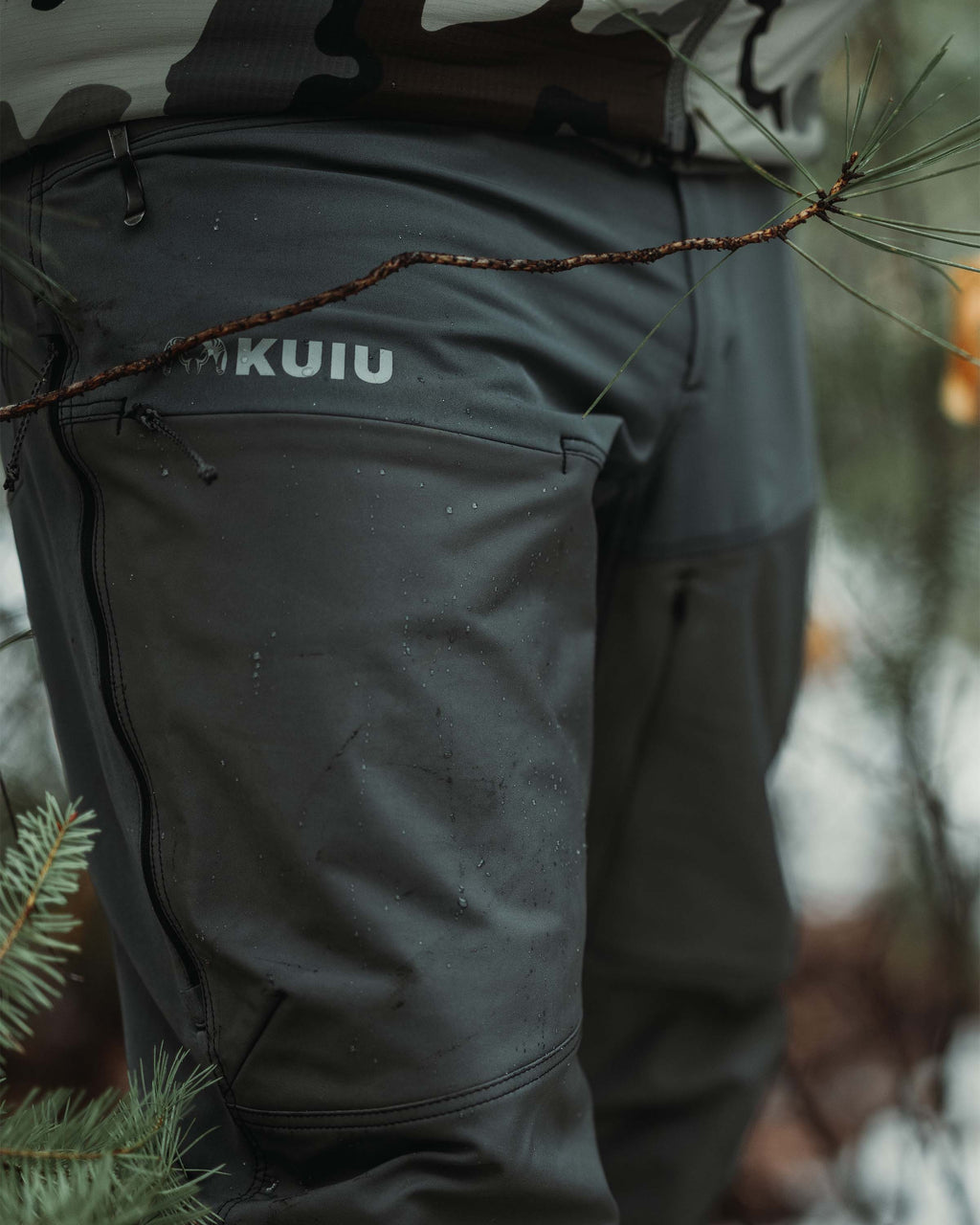 Front of PRO Brush Pant in Gunmetal Grey Color Highlighting Durability Paneling