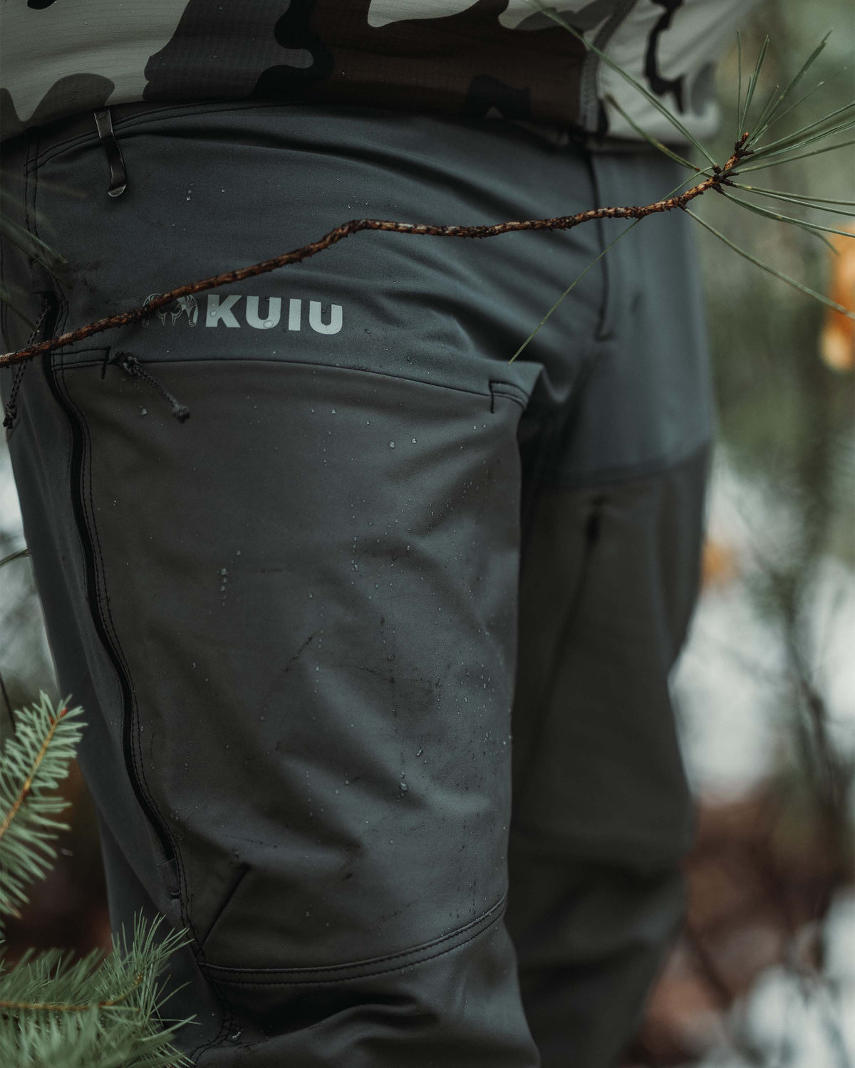 Front of PRO Brush Pant in Gunmetal Grey Color Highlighting Durability Paneling