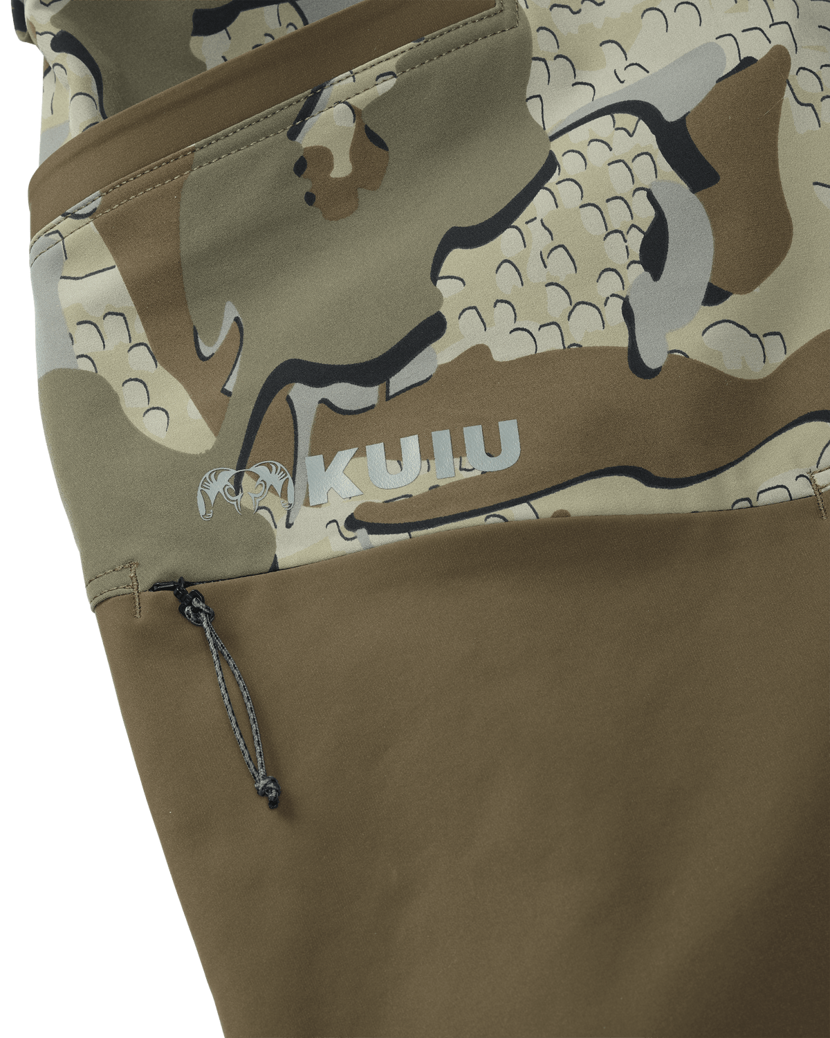 Detail of the lighter and heavier fabrics meeting on upper thigh of PRO Brush Pant in Valo Camouflage