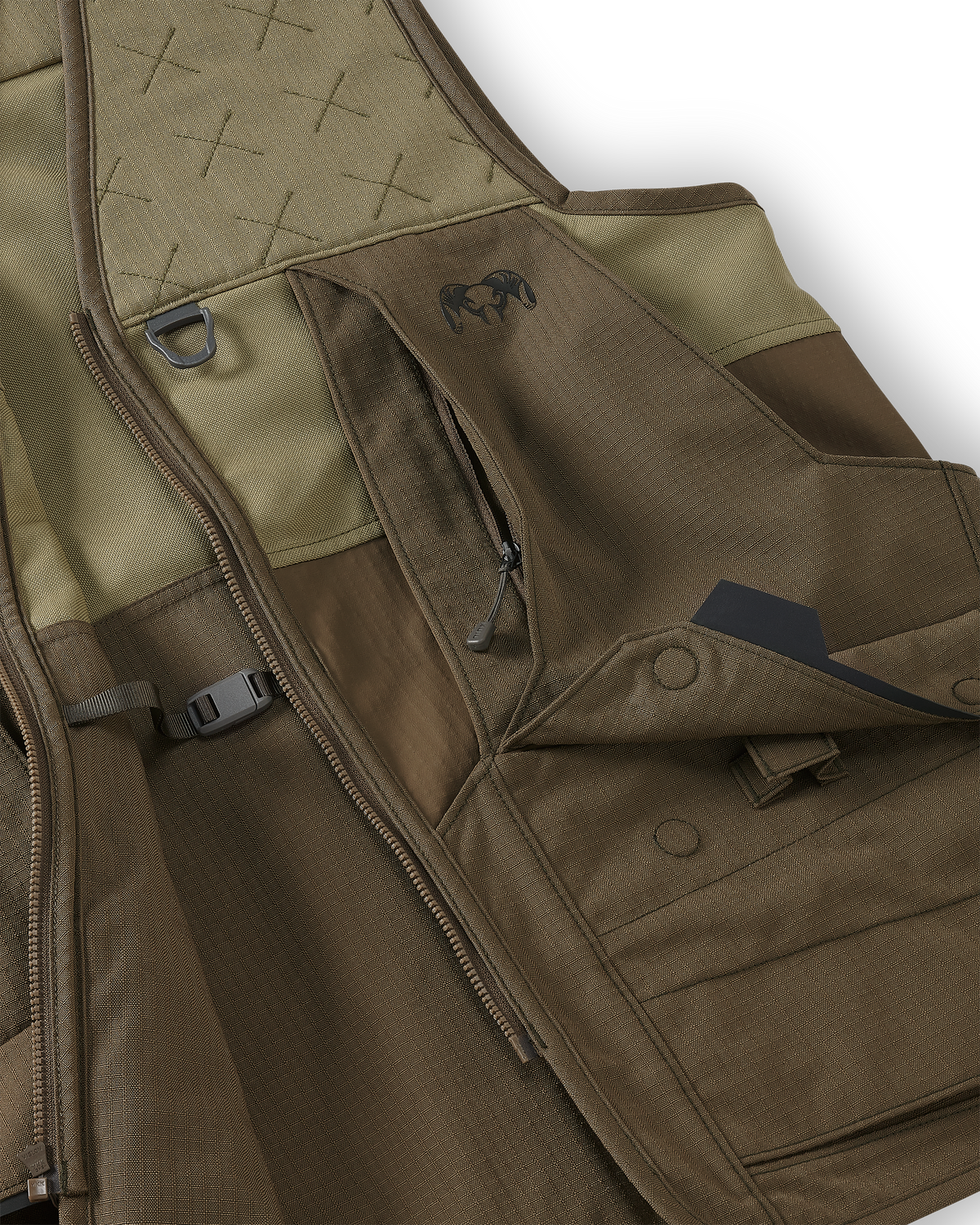 Close-up of front cargo pockets with magnetic snap-down flaps and easy-grab loops on the Core Upland Vest in Major Brown/Khaki