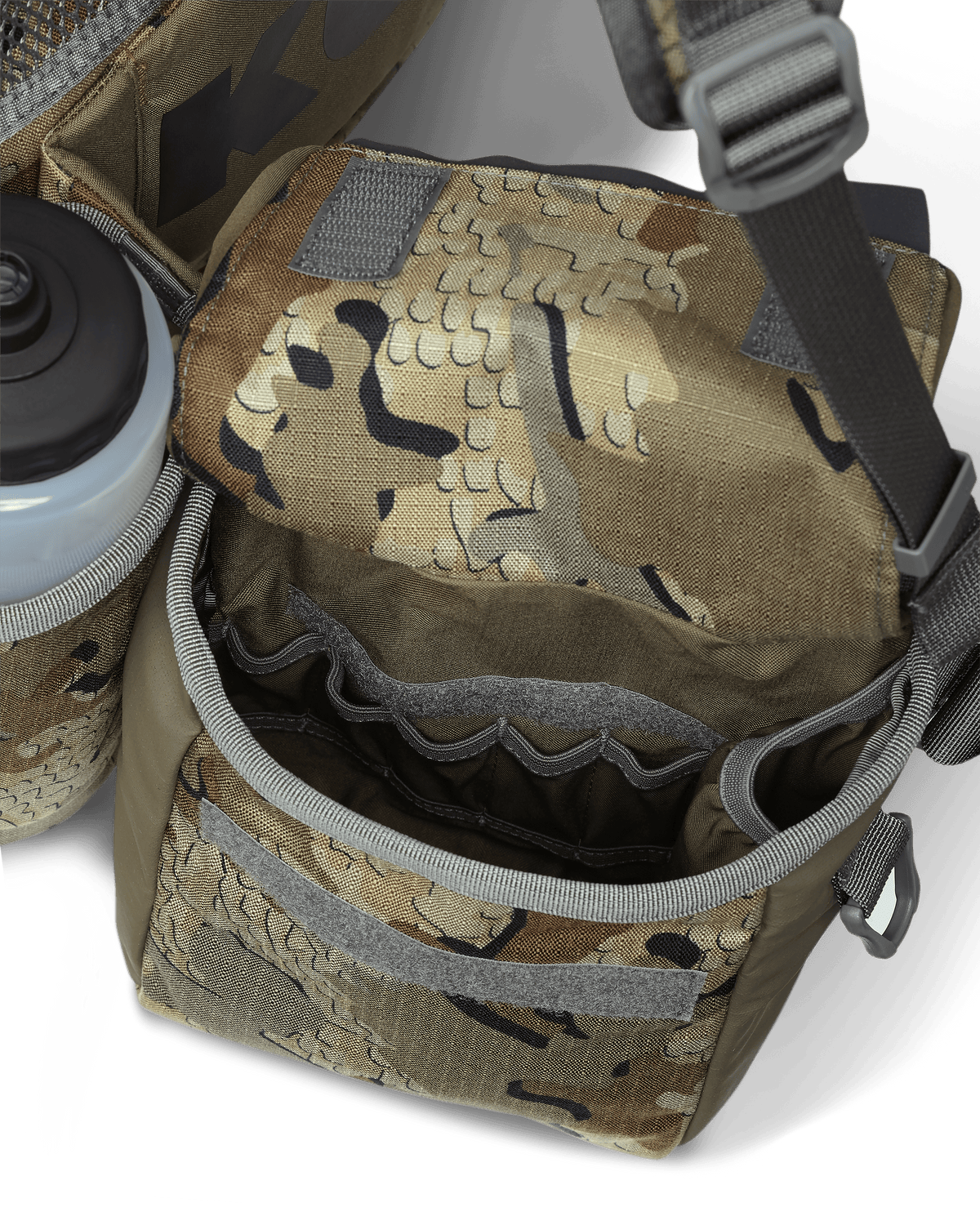 Inside view of deep hip pouch on the Upland Field Vest in Valo Camouflage