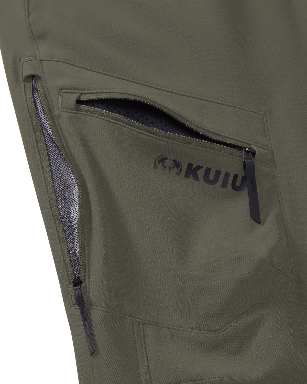 Close-up of mesh lined zippered hip vents and zippered cargo pocket on the Youth Attack Pant in Ash Brown