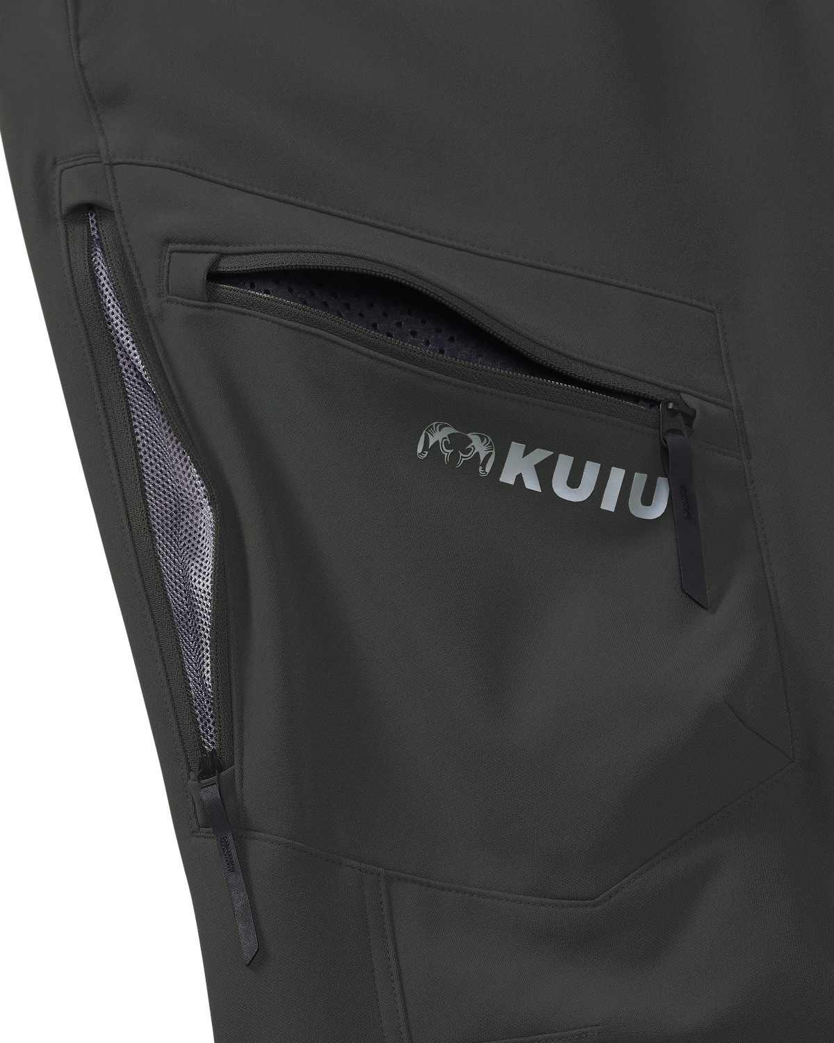 Close-up of mesh lined zippered hip vents and zippered cargo pocket on the Youth Attack Pant in Dark Gunmetal Grey