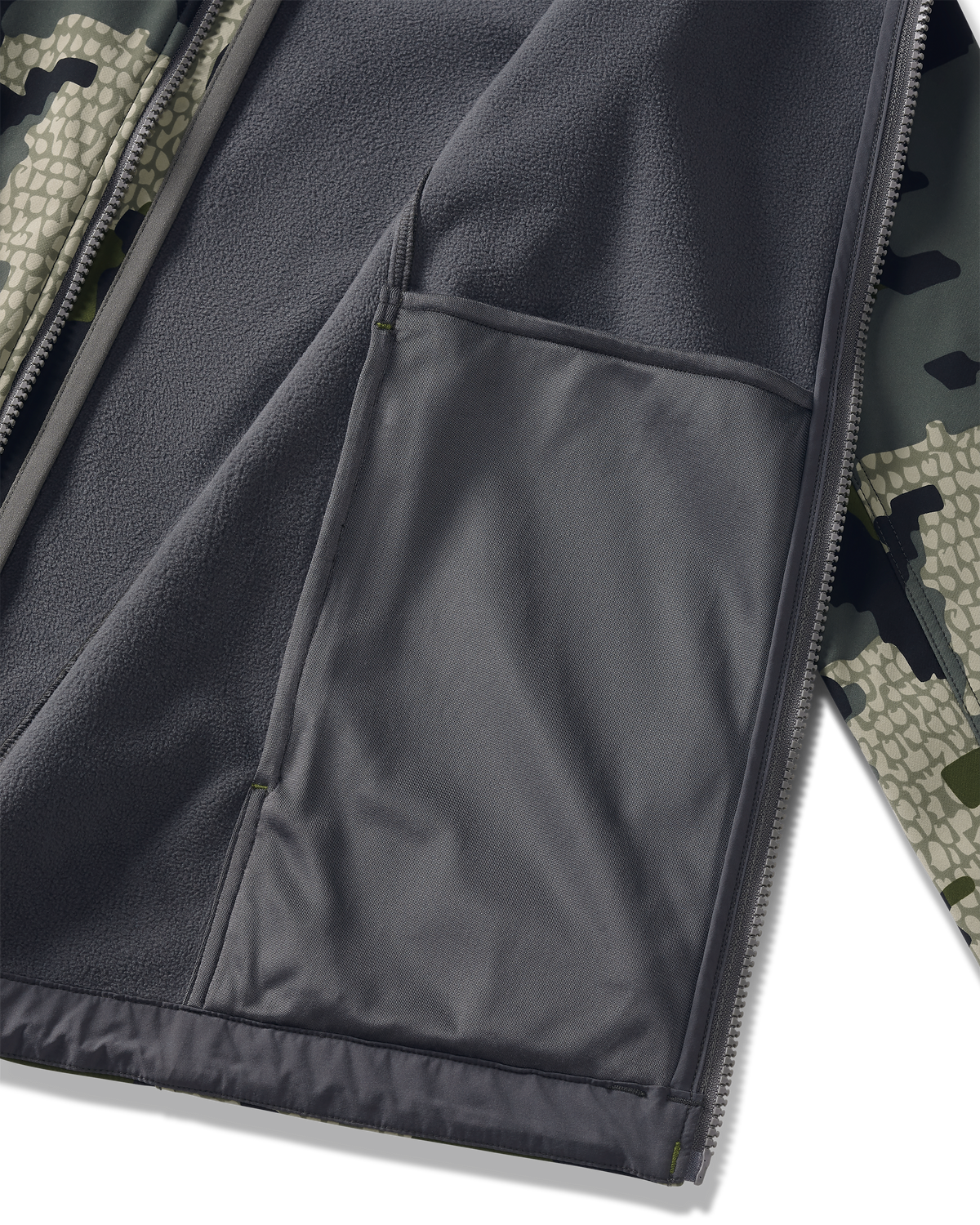 Detail of interior drop pocket on Youth Trail Blazer Jacket in Verde Camouflage