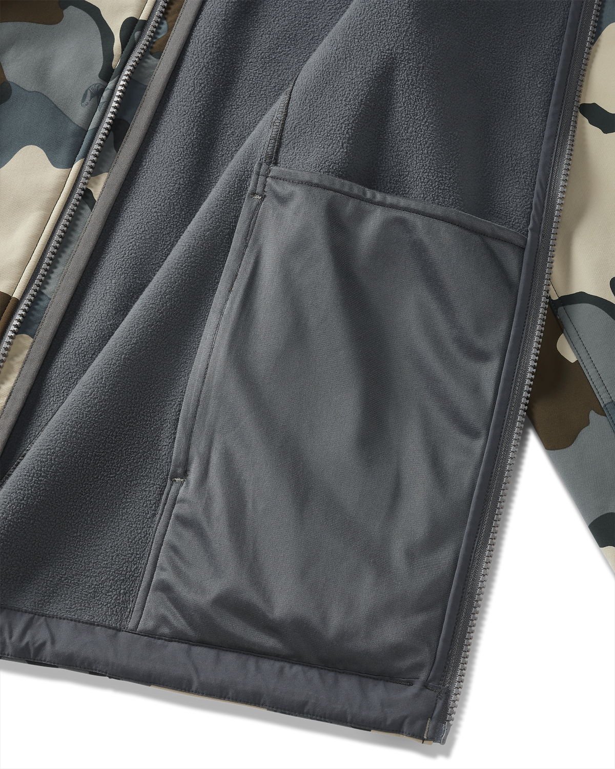 Detail of interior drop pocket on Youth Trail Blazer Jacket in Vias Camouflage