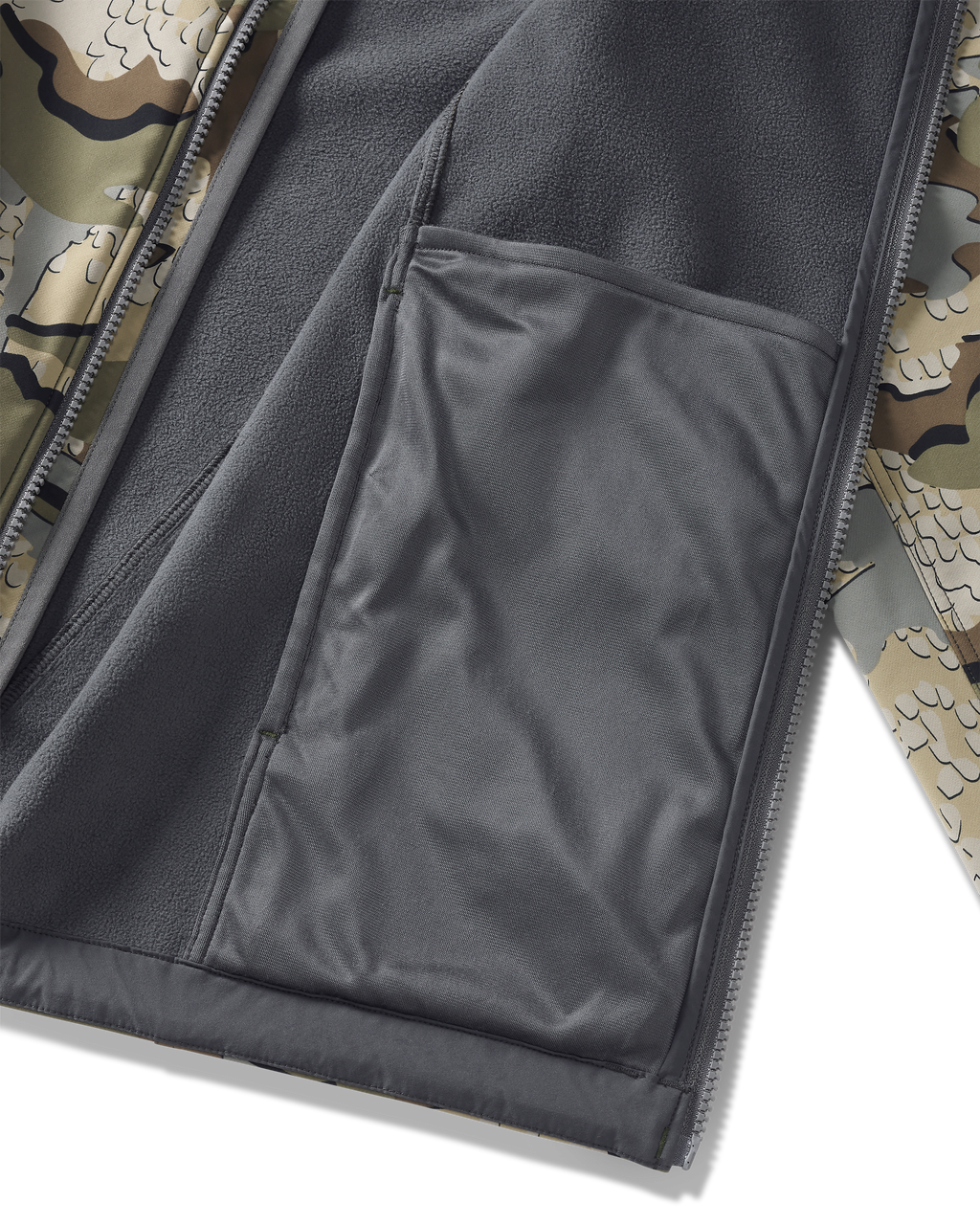 Detail of interior drop pocket on Youth Trail Blazer Jacket in Valo Camouflage