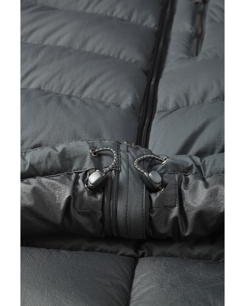 Lower, Front View of Super Down Pro Hooded Jacket in Gunmetal Grey, Highlighting Adjustable Lower Hem
