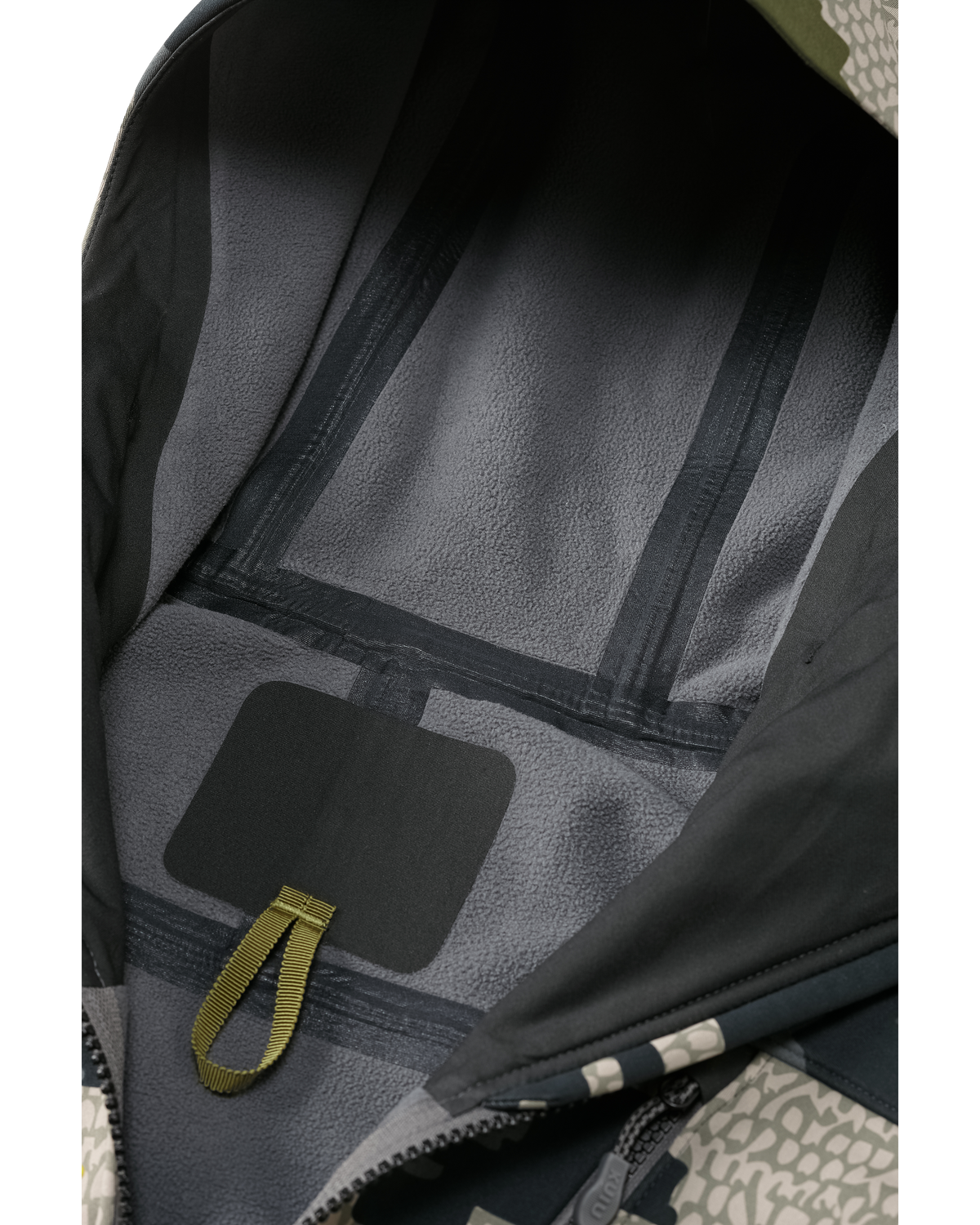 Front, Interior View of Axis Hybrid Hooded Jacket in Verde Camouflage Highlighting Micro-Fleece Backer and Seam Tape in Critical Areas