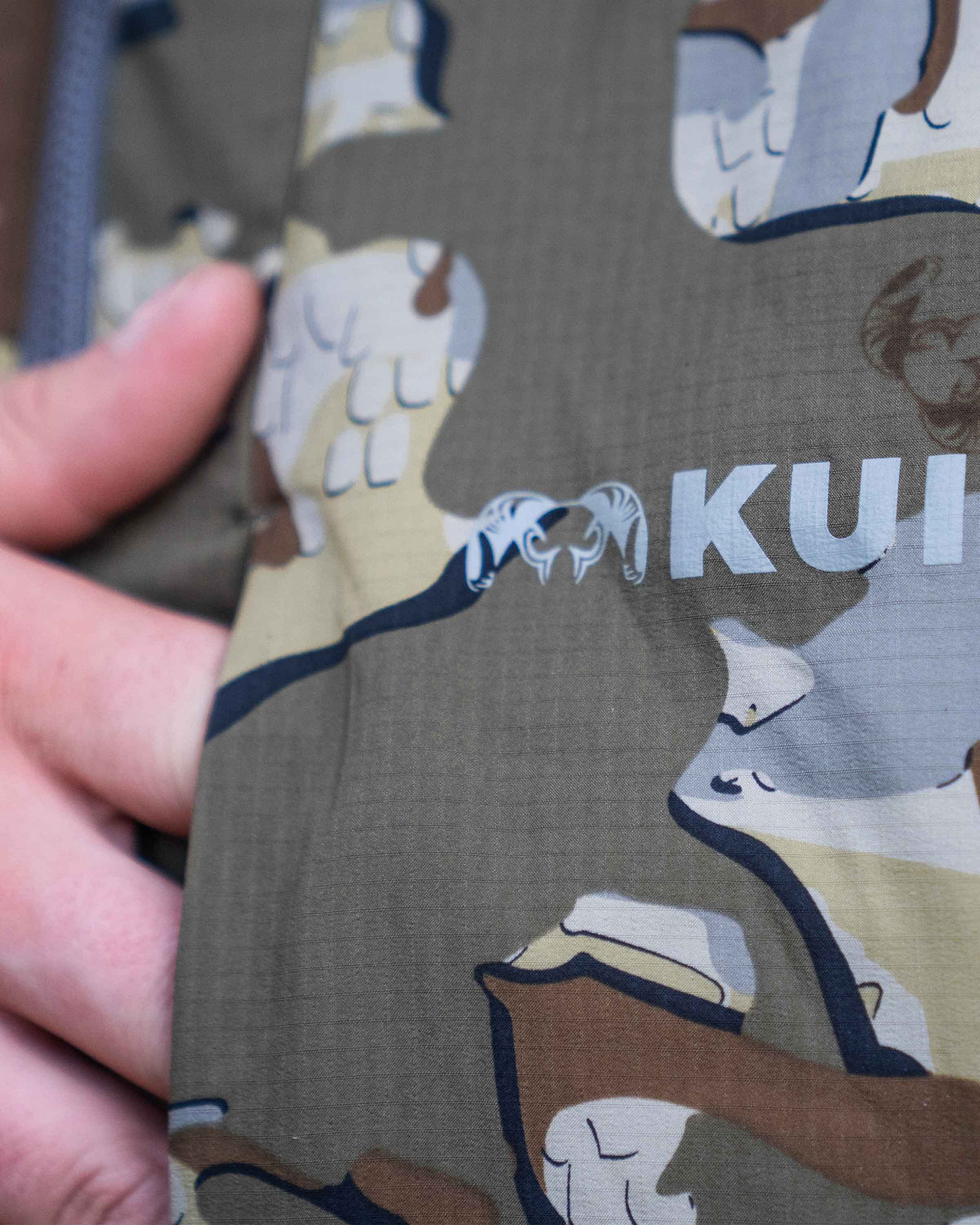 Zoomed in detail hand pocket on the Kenai Jacket in Valo Camouflage