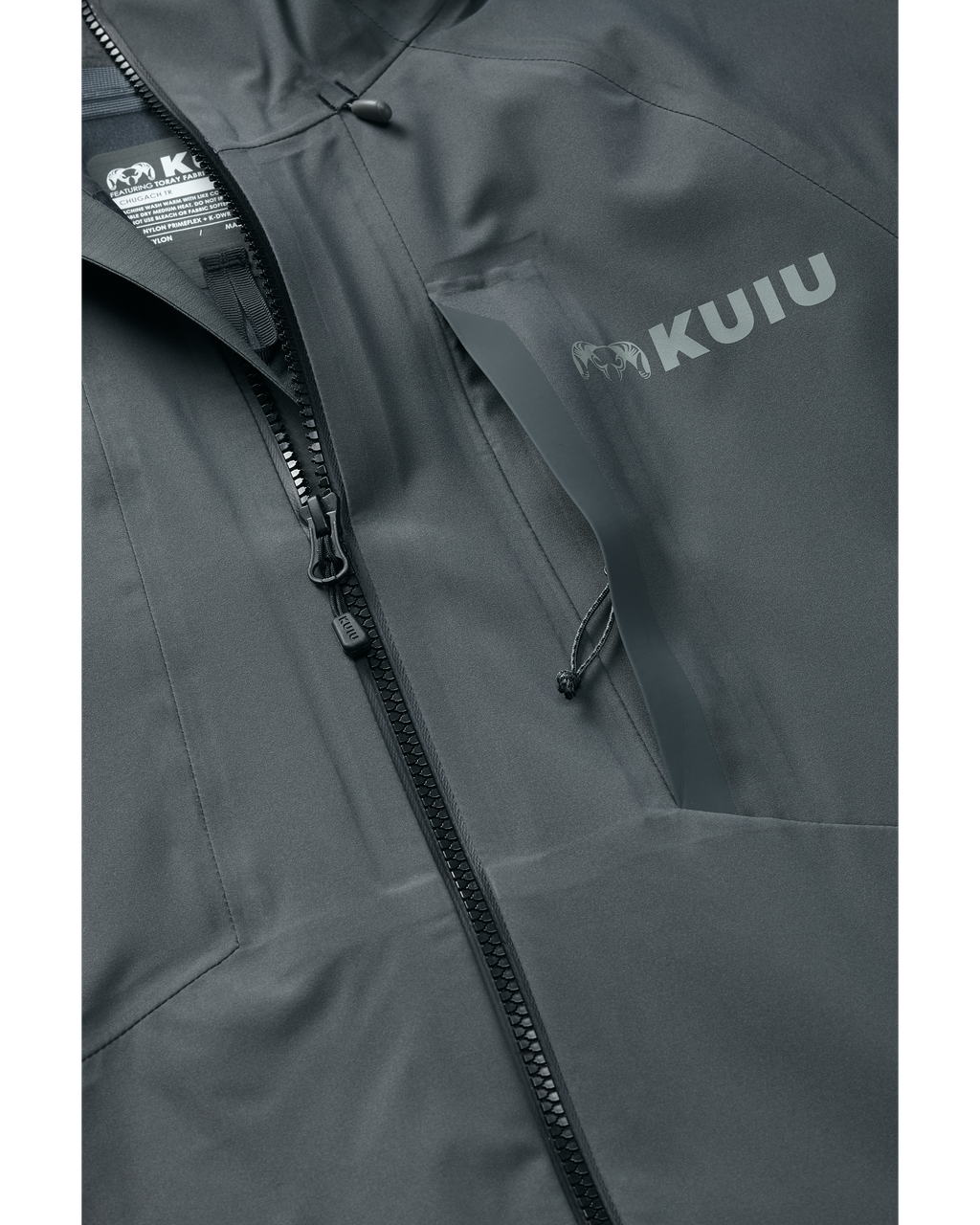 Detail of partially open zippered chest pocket on Chugach TR Rain Jacket in Gunmetal Grey