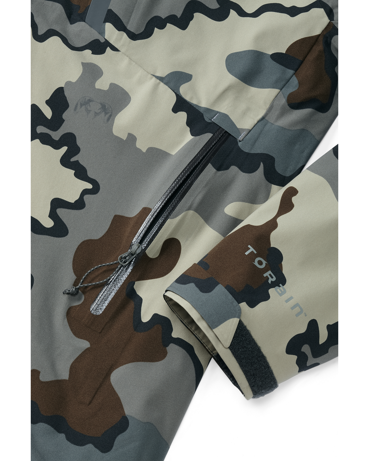 Detail of open zippered hand pocket and cuff on Chugach TR Rain Jacket in Vias Camouflage