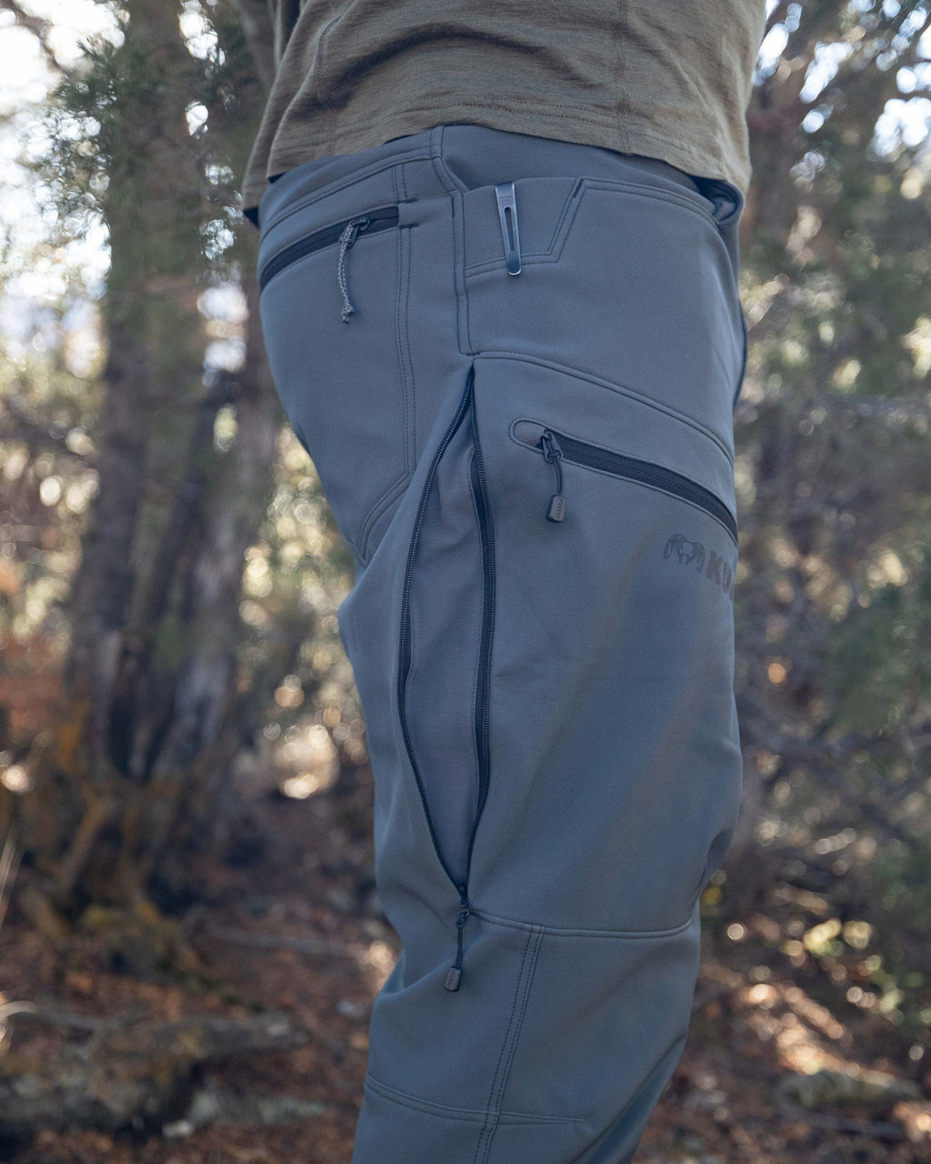 Open YKK Zippered Hip Vents and Open Hand Pocket with Knife Clip Panel of the Guide PRO Pant in Gunmetal Grey