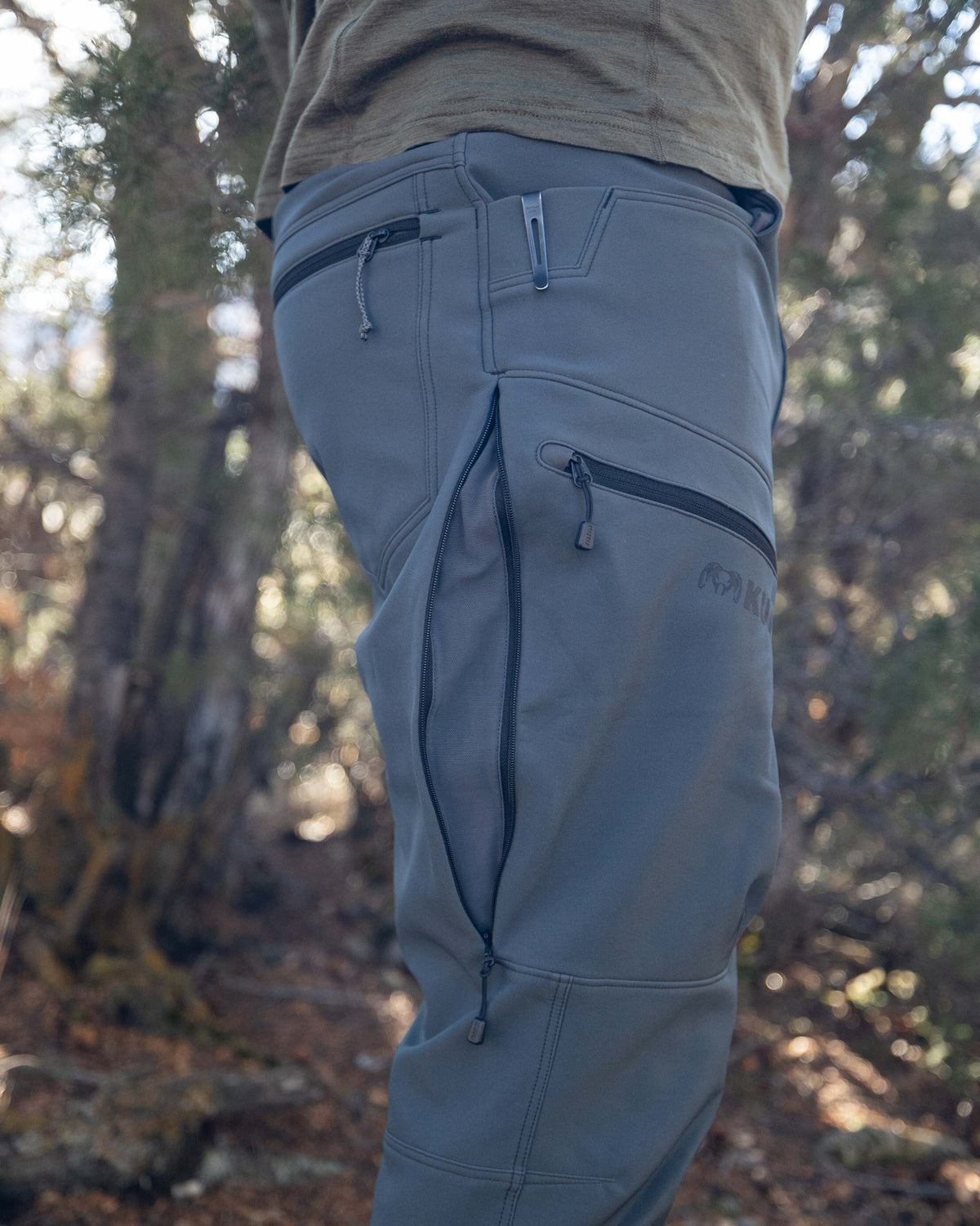 Open YKK Zippered Hip Vents and Open Hand Pocket with Knife Clip Panel of the Guide PRO Pant in Gunmetal Grey