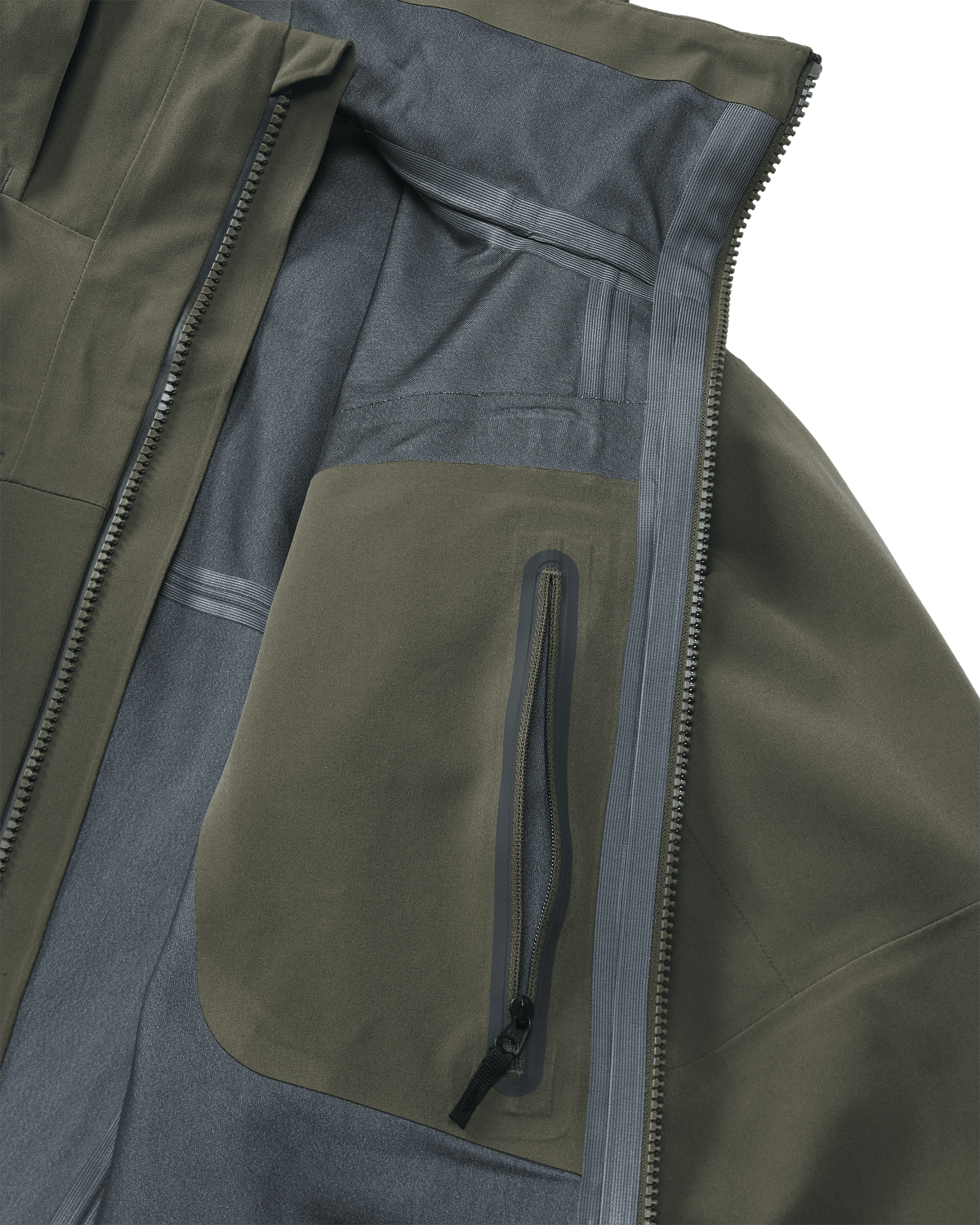 Interior view of Yukon TR Rain Jacket in Ash Brown showing internal zippered chest pocket and seam tape