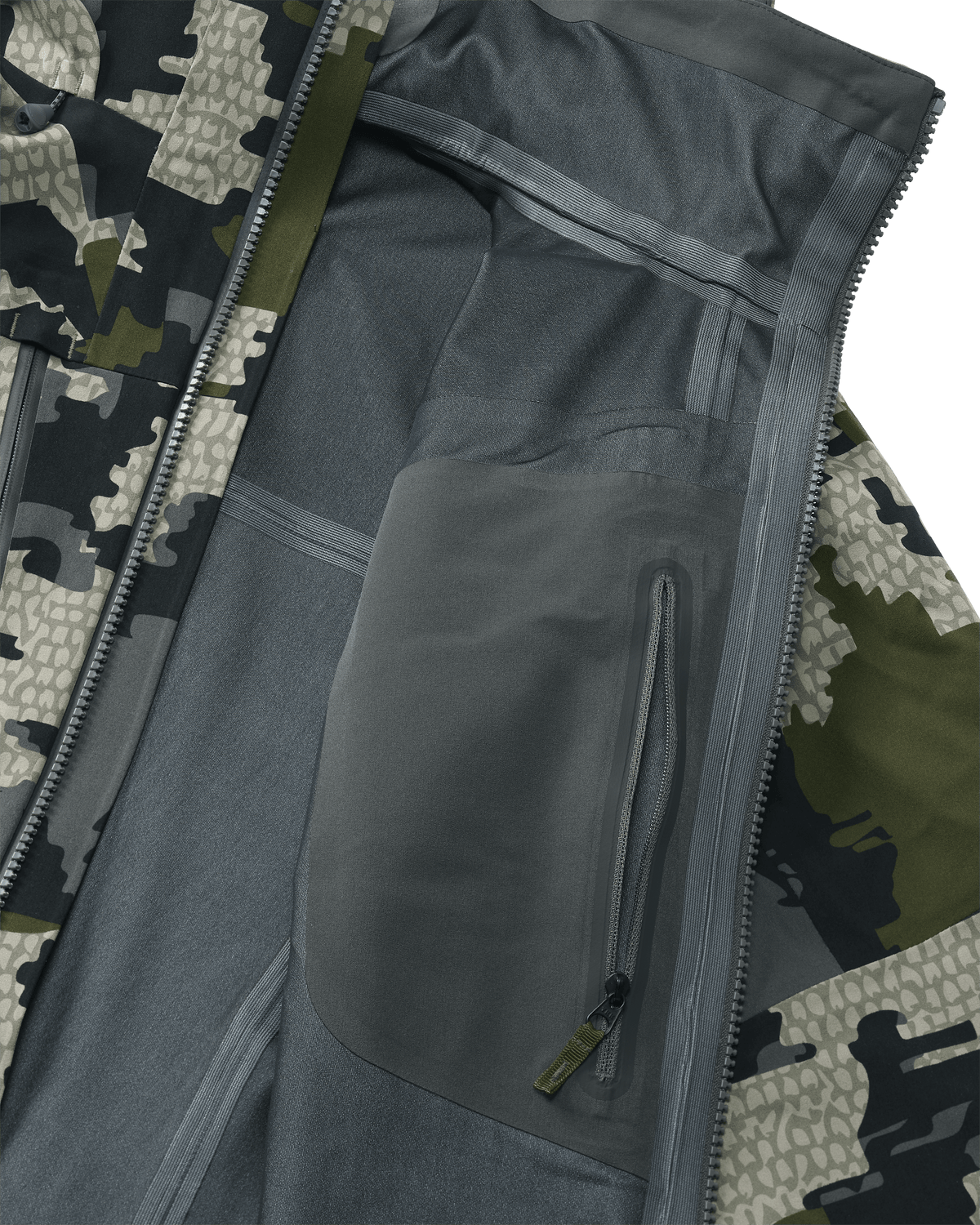 Interior view of Yukon TR Rain Jacket in Verde Camouflage showing internal zippered chest pocket and seam tape