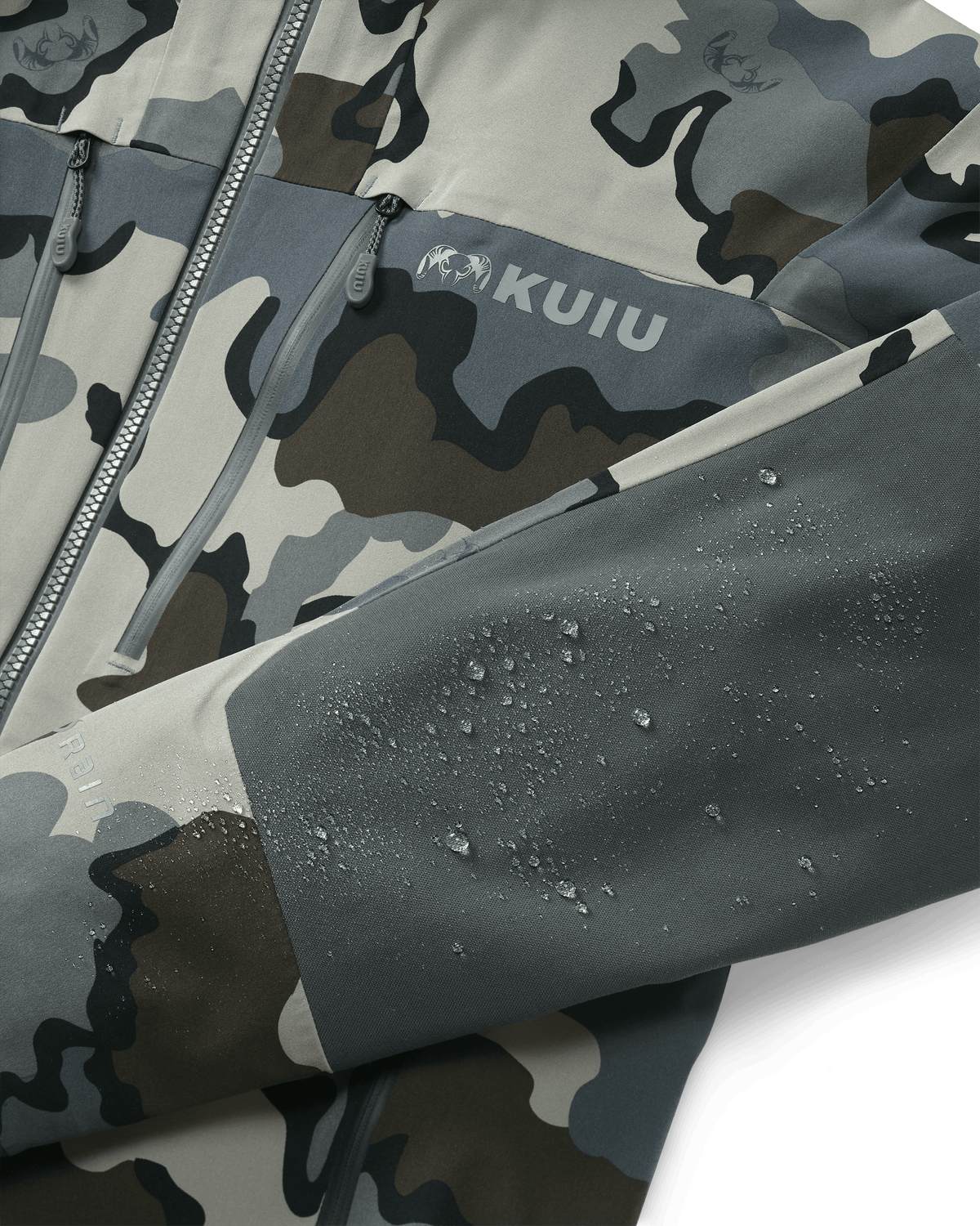 View of Yukon TR Rain Jacket in Vias Camouflage with water droplets on the sleeve