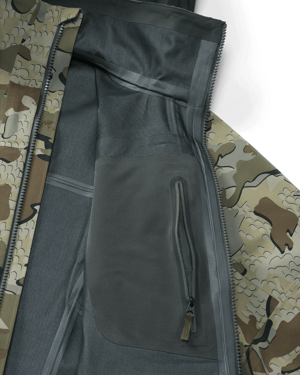 Interior view of Yukon TR Rain Jacket in Valo Camouflage showing internal zippered chest pocket and seam tape