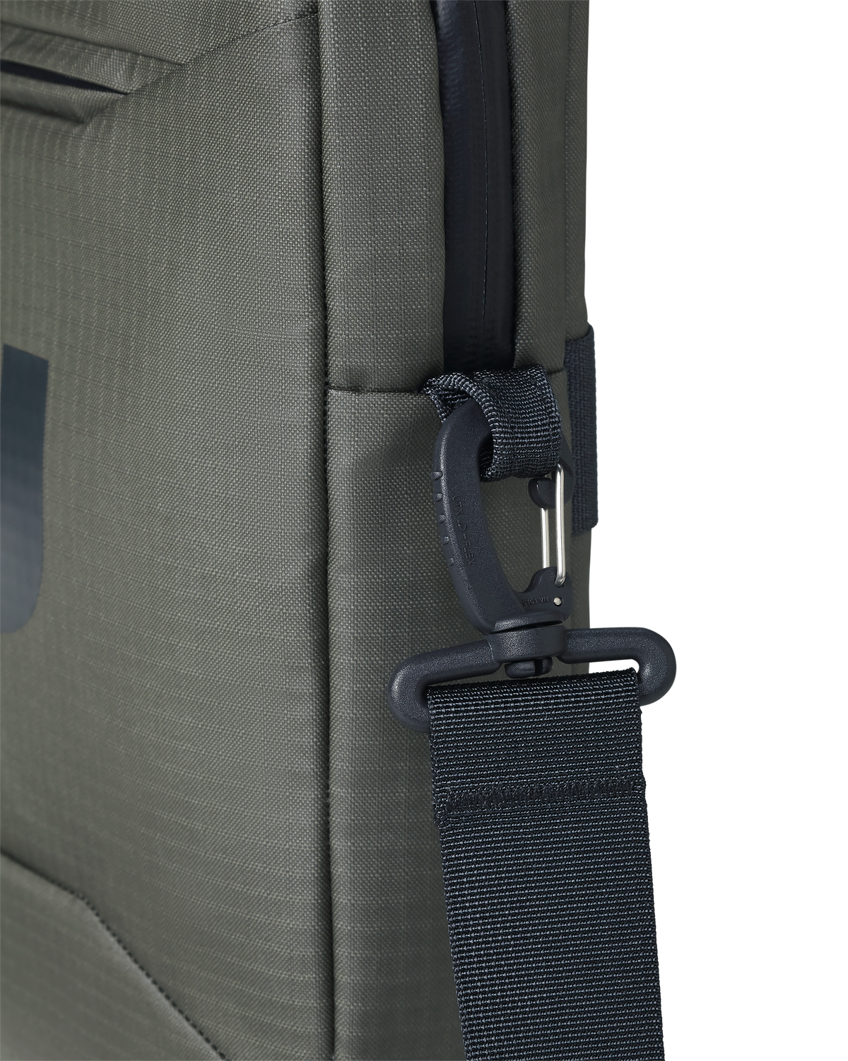 Close-up of quick-detach swivel hook clip on the Waypoint Messenger Bag in Stone Grey