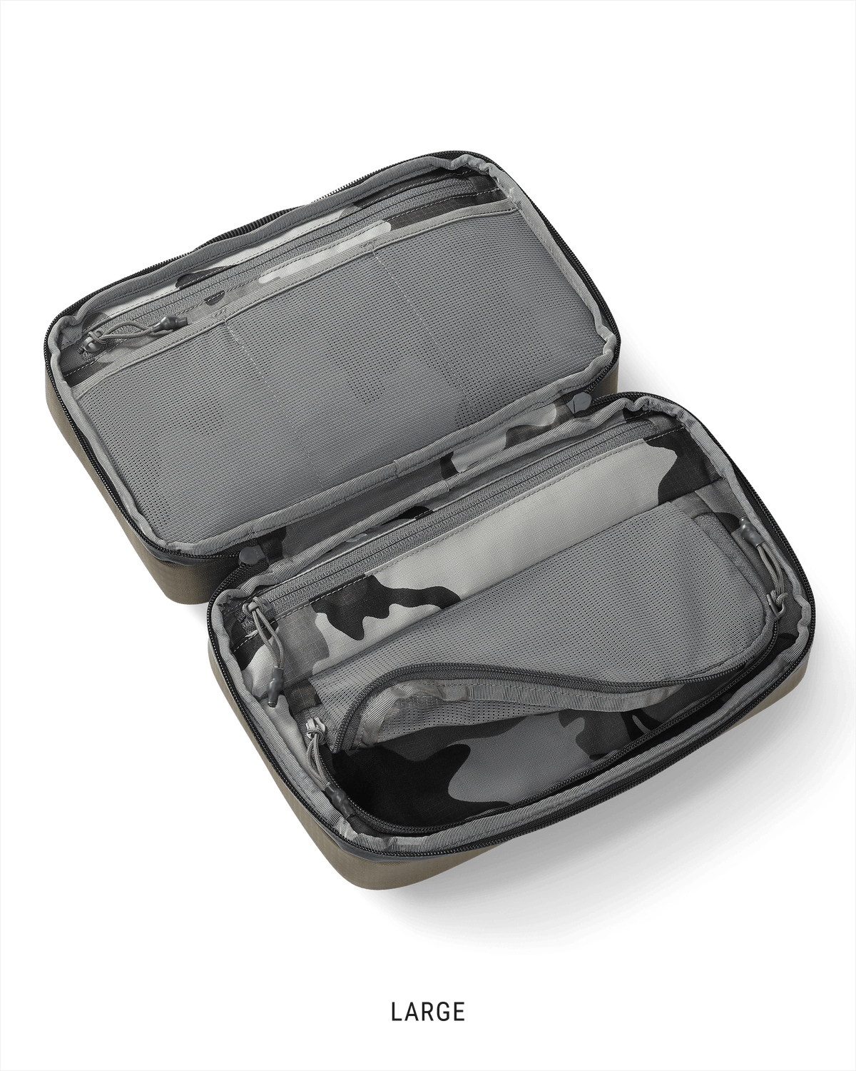 Clear view of the interior storage of a large Waypoint Dopp Kit in Bourbon Brown