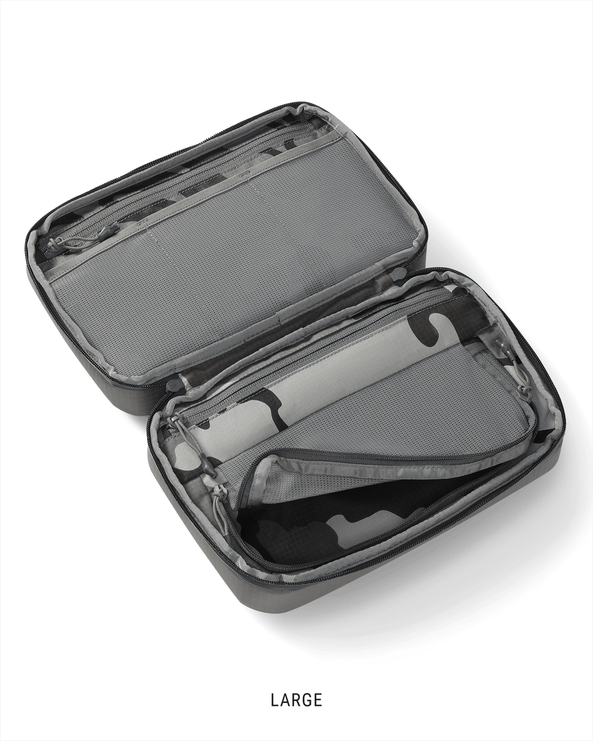 Clear view of the interior storage of a large Waypoint Dopp Kit in Stone Grey
