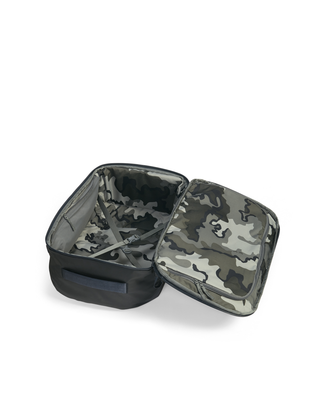 Open view of Waypoint 2800 in Bourbon brown showing vias storm camouflage colored interior, crossed compression straps, and zippered storage stretch pockets sewn to sidewall of bag