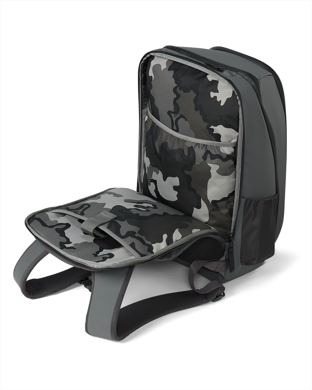 Side view of Waypoint Travel Backpack in Gunmetal Grey with opened back zippered compartment