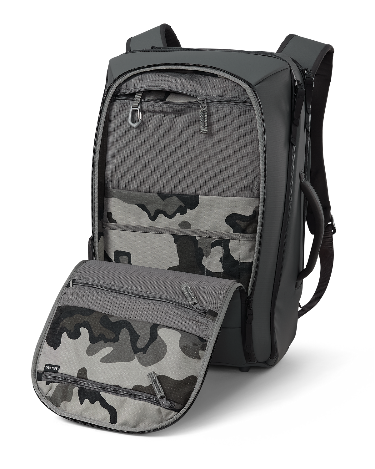Front of Waypoint Travel Backpack in Gunmetal Grey, showcasing opened front storage pocket