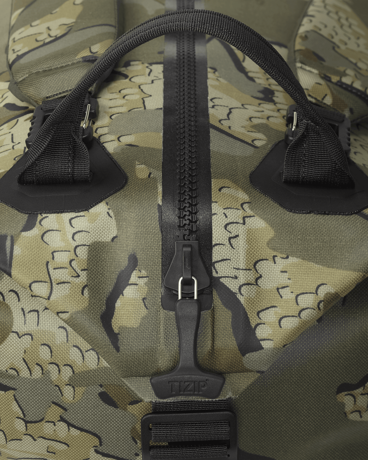 Side of Kodiak 3000 Submersible Duffel in Valo Camouflage Highlighting TIZIP® Masterseal Watertight and Airtight Zippers