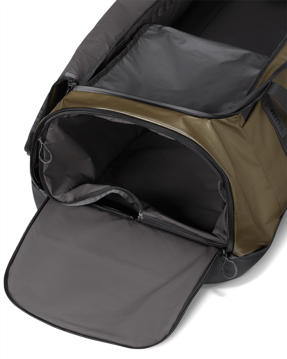  Zippered end pocket on the KUIU TwoTrack Duffel in Bourbon Brown, with waterproof and washable zip-out liner bag for wet gear storage