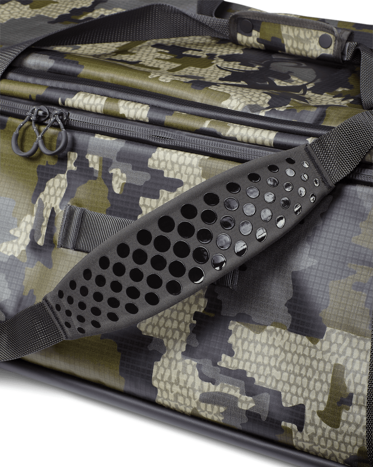 Close-up of non-slip, silicone dot matrix grip, padded shoulder strap on KUIU Two Track Duffel Bag in Verde Camouflage