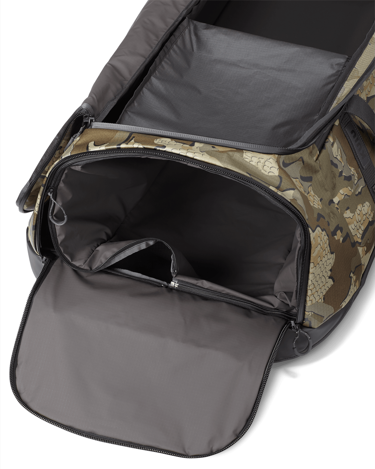 Zippered end pocket on the KUIU TwoTrack Duffel in Valo Camouflage, with waterproof and washable zip-out liner bag for wet gear storage