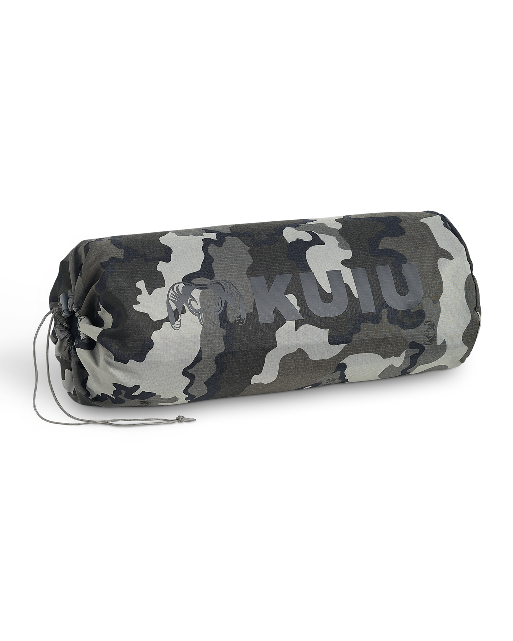 A cylindrical drawstring bag, displaying storage of the Distance AT Blanket in Vias Storm camouflage.