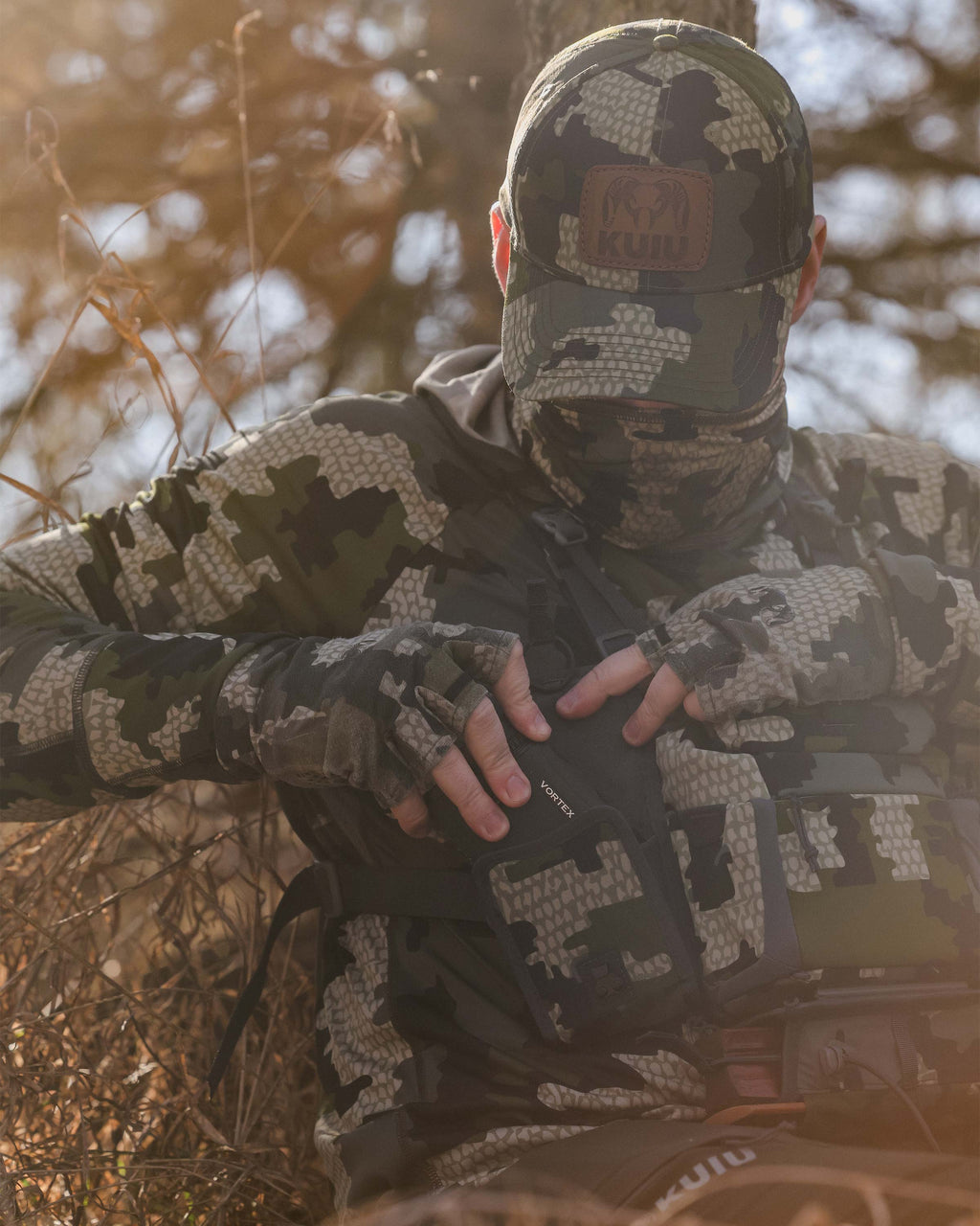 Hunter stowing away his range finder