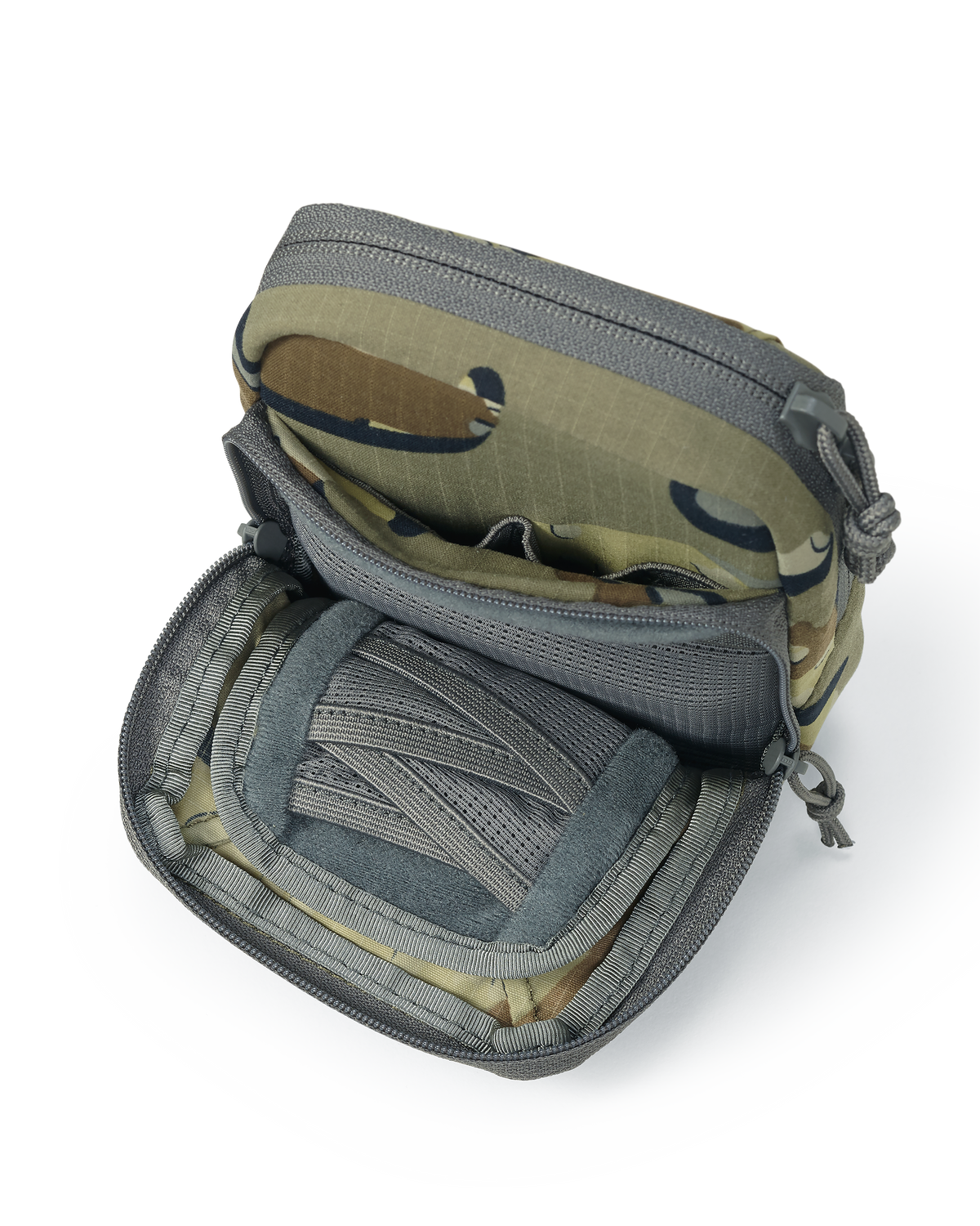 Unzipped front pouch of the Slate Call Holder in Valo Camouflage, Featuring internal mesh divide pockets for storage