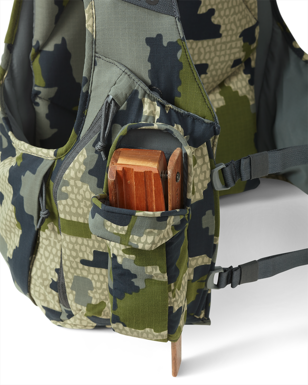 Front view of box call holder with magnetic closure pocket, displaying box call securely stored inside