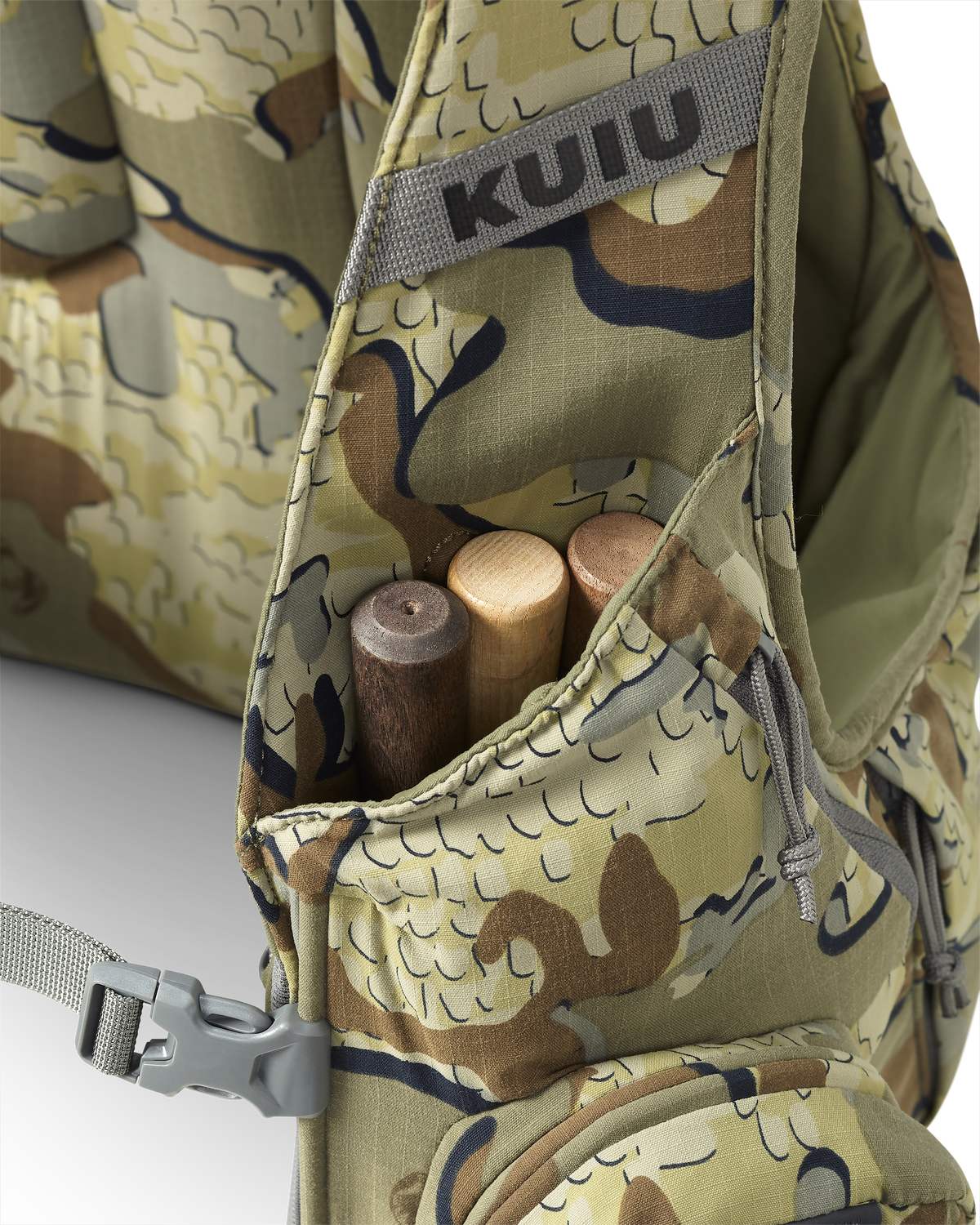 Close-up of front drop pocket on the Rival Turkey Vest in Valo Camouflage, featuring three strikers inside