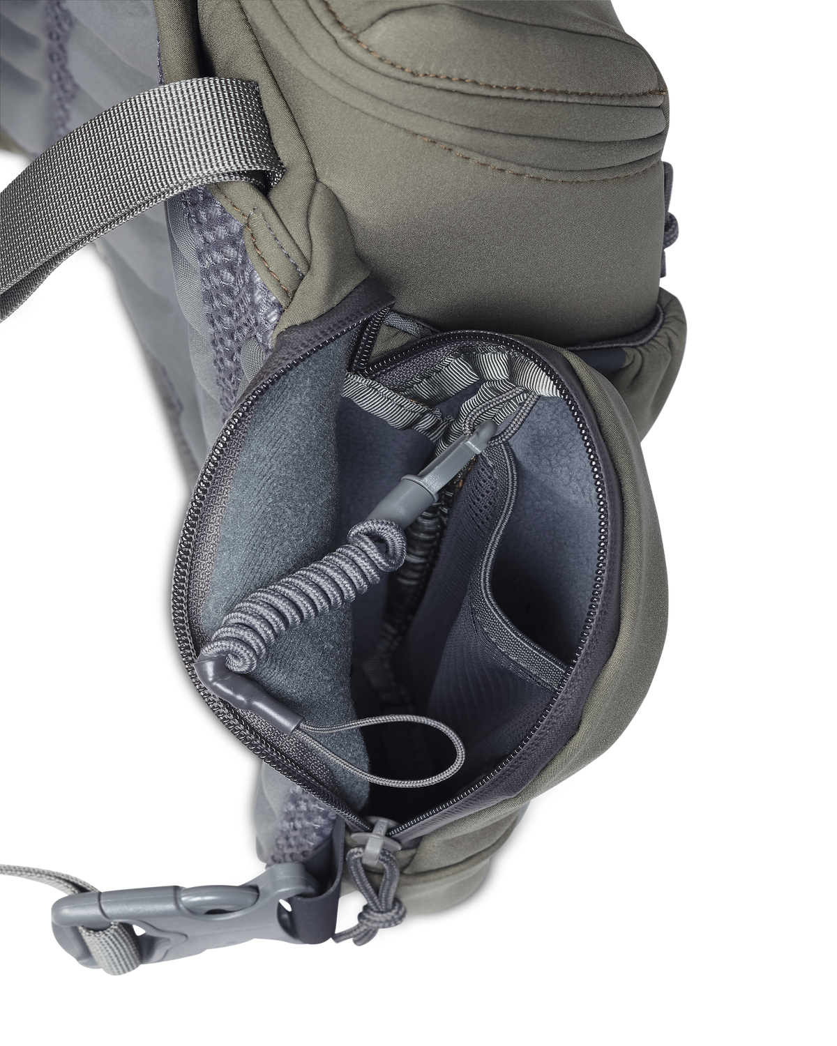 Inside view of exterior side pocket accessory pouch of the PRO Chest Pack in Ash Brown with an attached lanyard