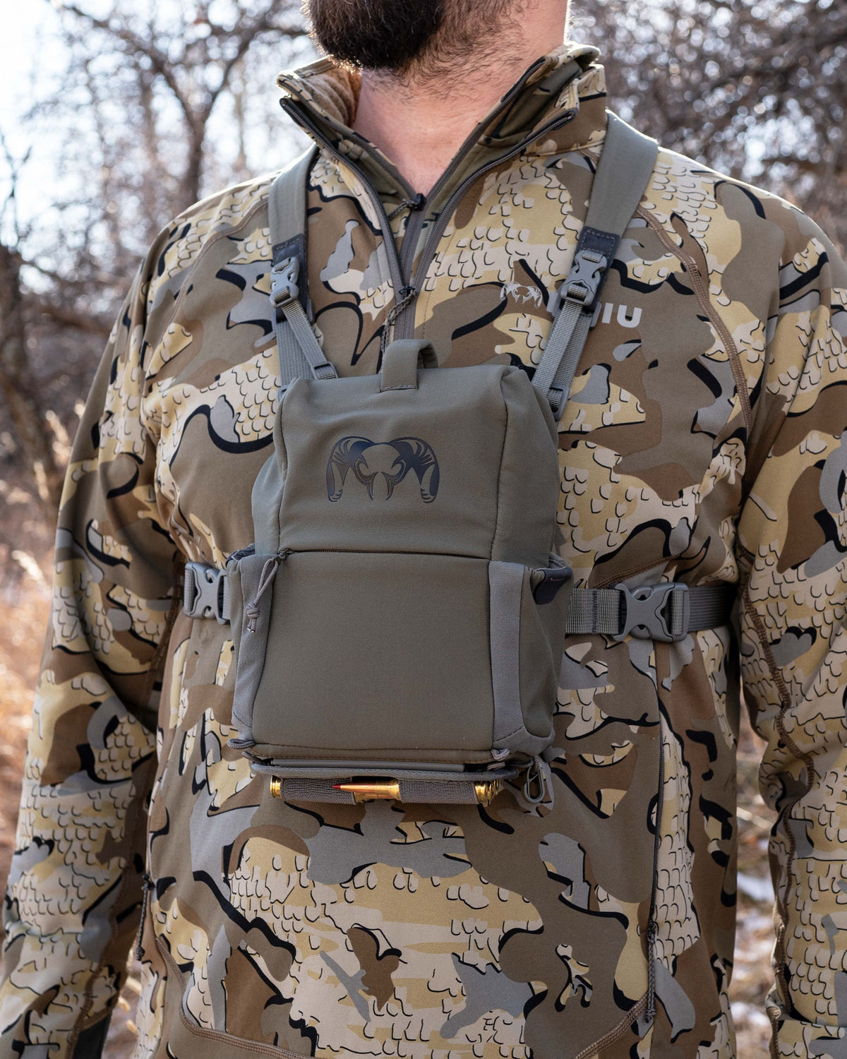 Front of Hunter wearing PRO G3 Bino Harness in Ash Brown