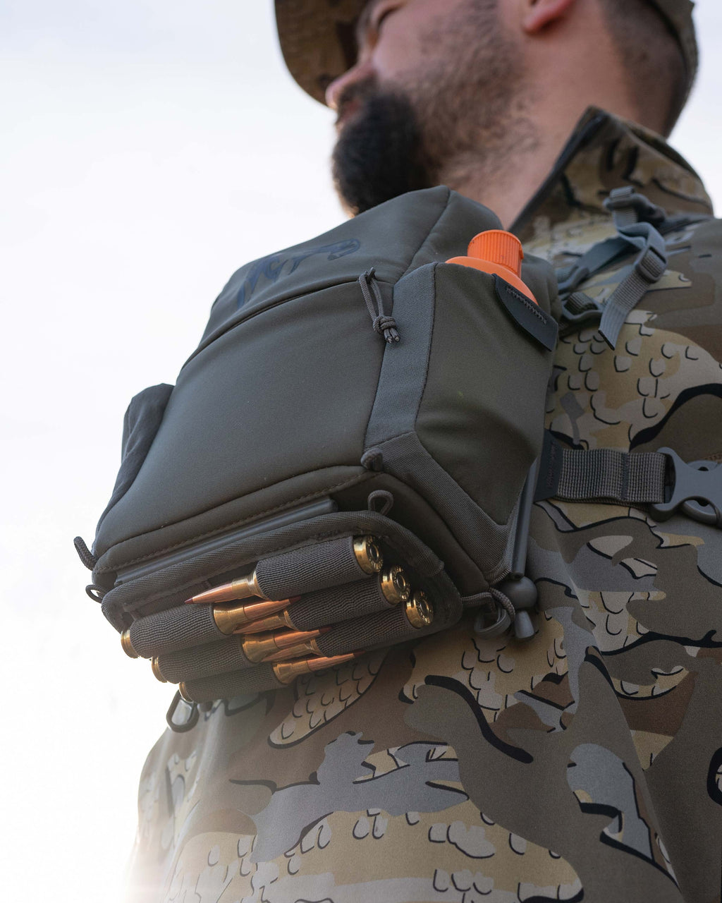 Bottom of PRO G3 Bino Harness in Ash Brown, Highlighting bottom track system holder with ammo 