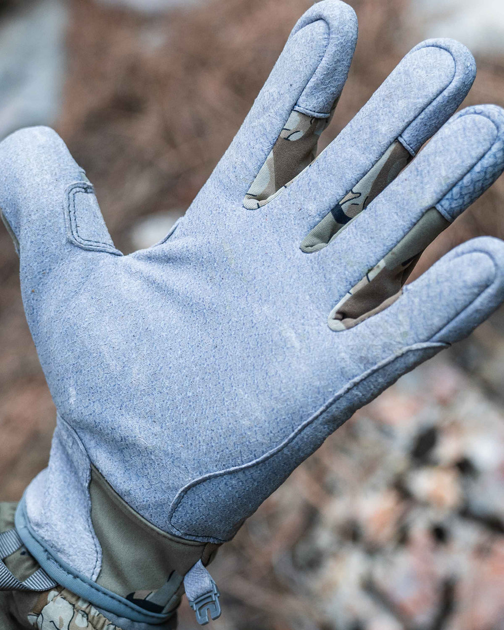 Palm View of Hunter Wearing Guide X Gloves in Valo Camouflage Highlighting Pittard's Oil Tac Leather