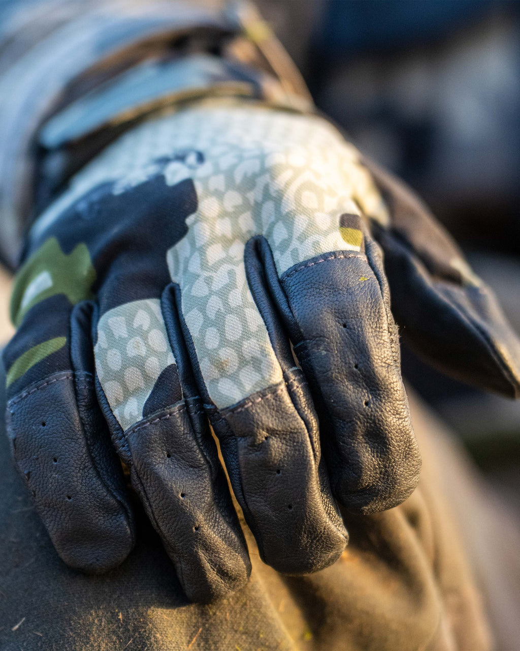 Close-up of Precision Glove in Verde Camouflage, Highlighting perforated vents across the fingers