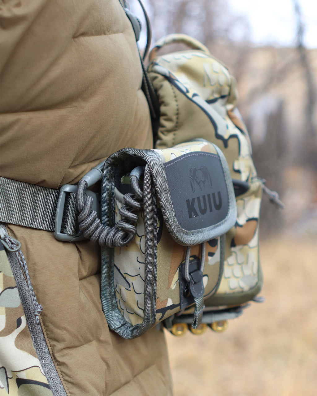 Close-up view of PRO G3 Rangefinder Holder attached on the right side of PRO G3 Bino Harness in Valo Camouflage