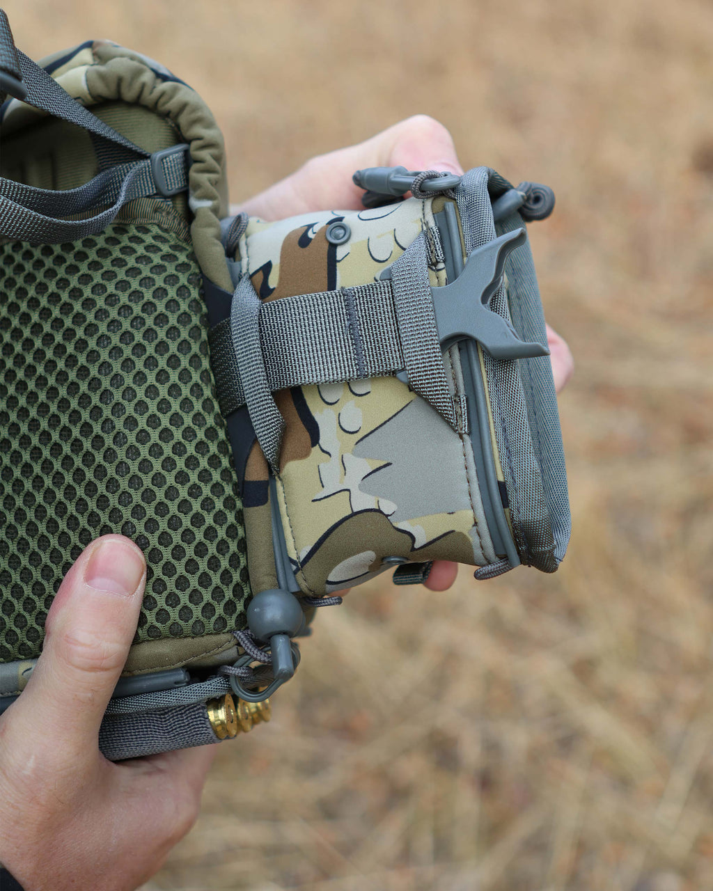Back of PRO G3 Rangefinder Holder in Valo Camouflage attached to the PRO G3 Bino Harness, Highlighting attachment point