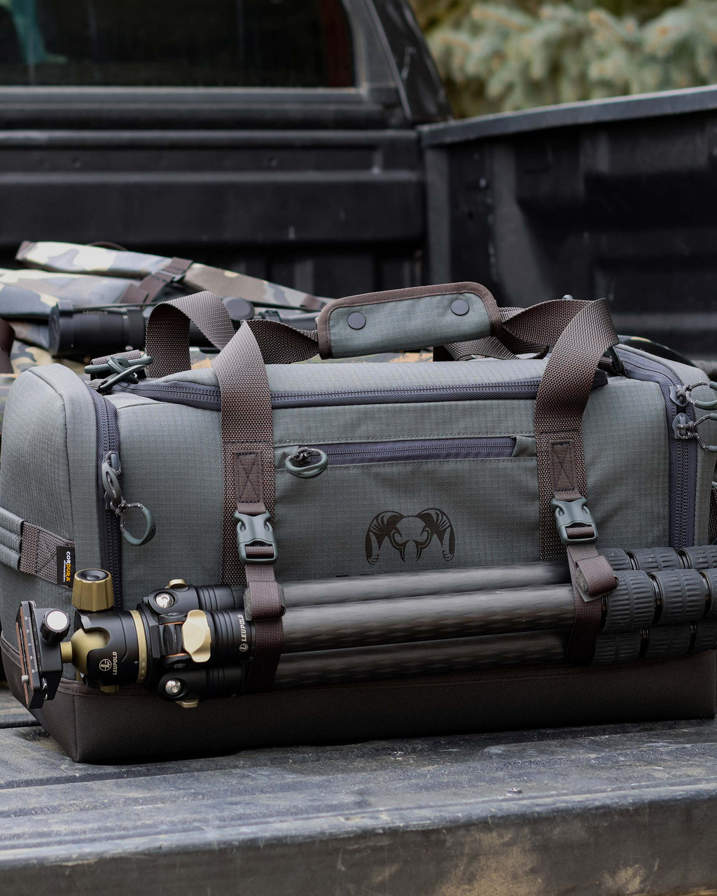 Distance Duffel in Truck Bed with tripod attached in Gunmetal