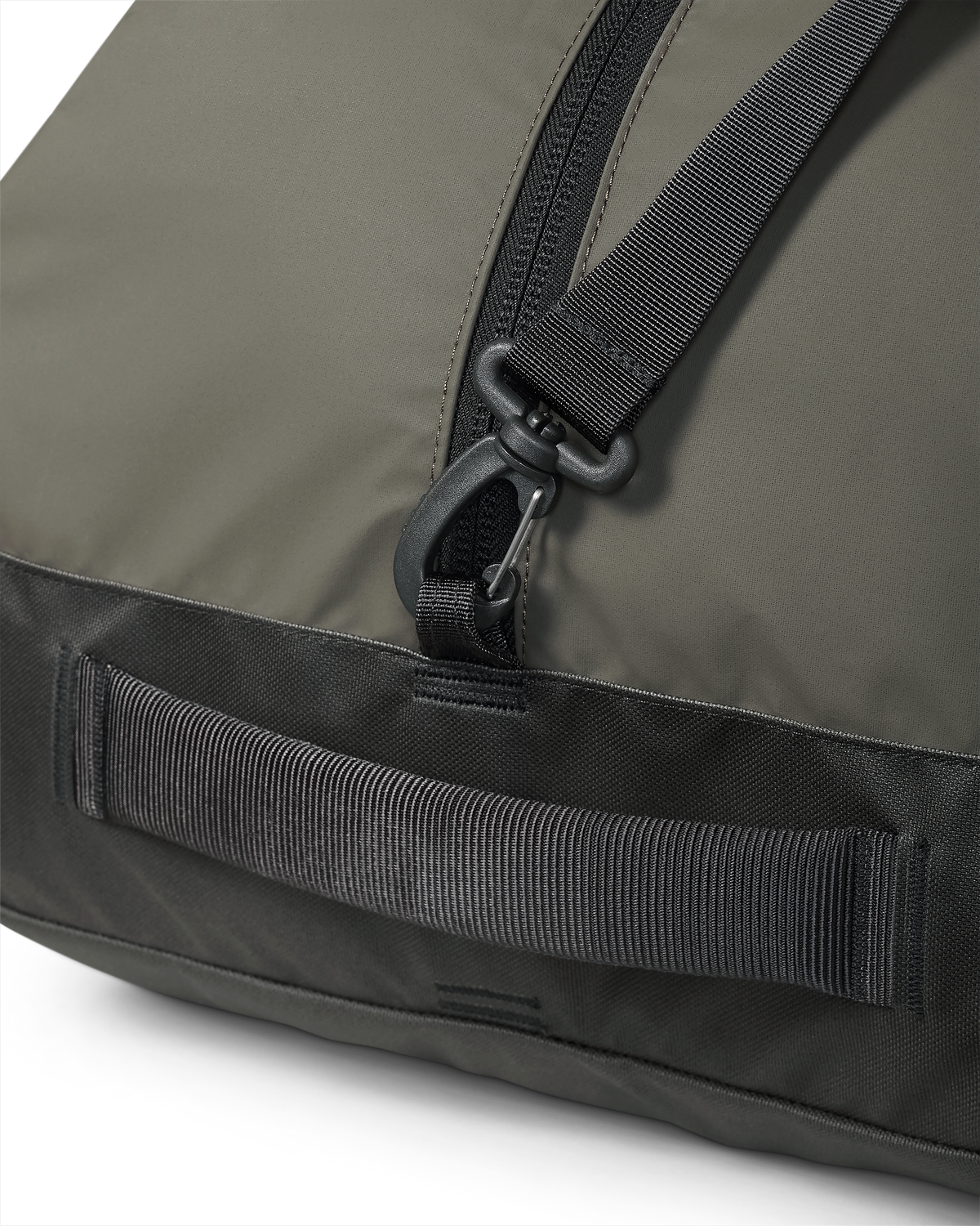 Close-up of side grab handles and removable shoulder straps on the Runway CORDURA® 3000 Duffel in Ash Color