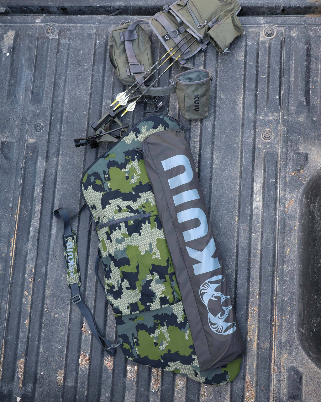 Aerial View of Front of Bow Travel Case in Verde Camoflouge Sitting in Truck Bed