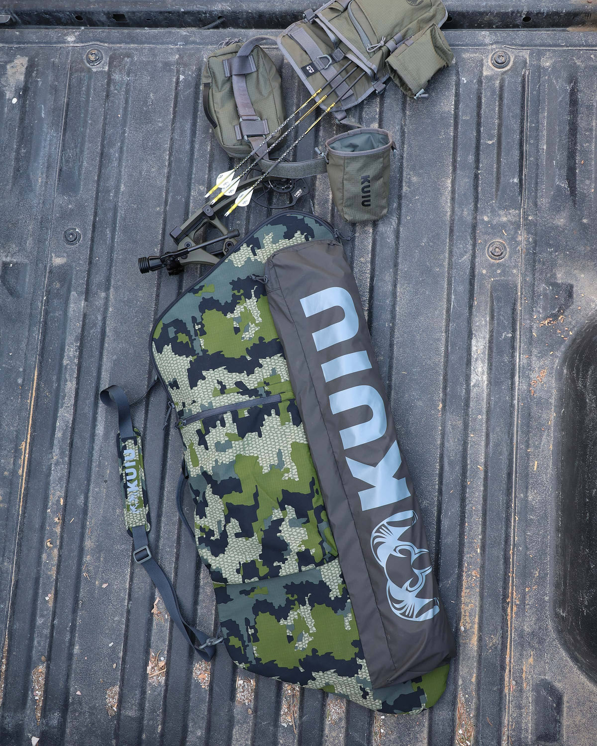 Aerial View of Front of Bow Travel Case in Verde Camoflouge Sitting in Truck Bed