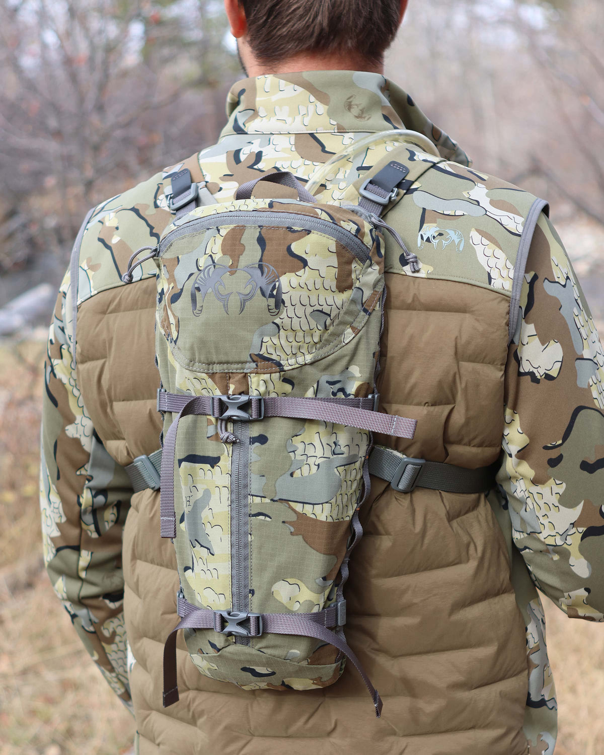 Back of Hunter wearing the PRO G3 Hydration Rig in Valo Camouflage color