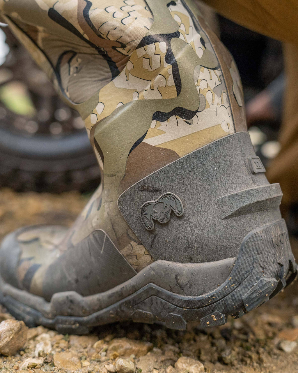 Back view of the kick-off heel tab on KUIU Mud Boot in Valo Camouflage