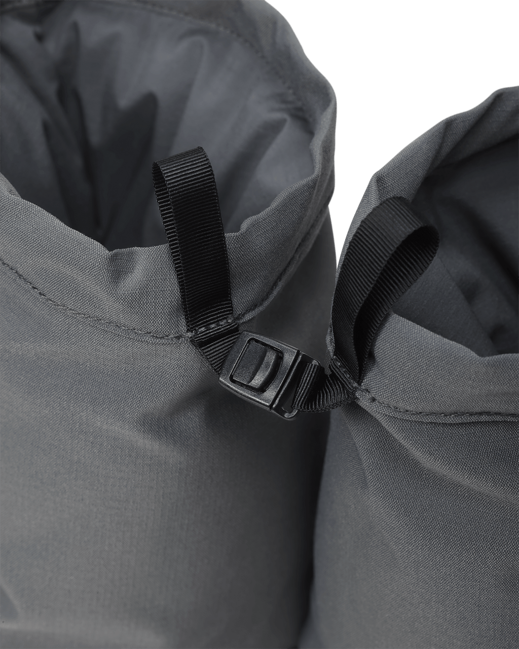 Close-up view of  pull tab and latch sewn at the back of Super Down Burner Bootie in Gunmetal Grey